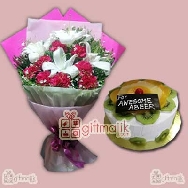 Buy Assorted Bunch of Lily Pink Carnations and half kg fresh fruit cake