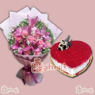 Send Beautiful paper packed bunch of mix lilies with Red Velvet Cake half kg